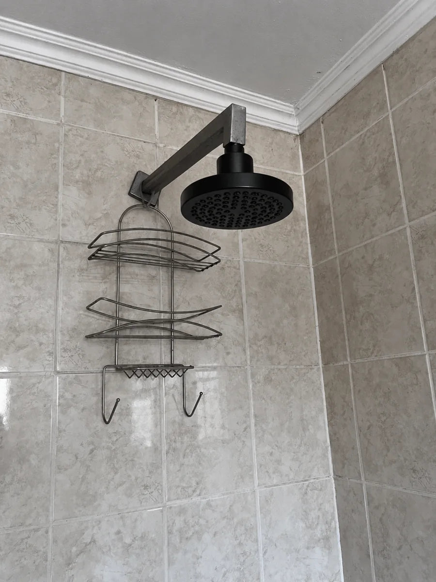 Customer photo of a VALOIR shower head installed above a shower caddy